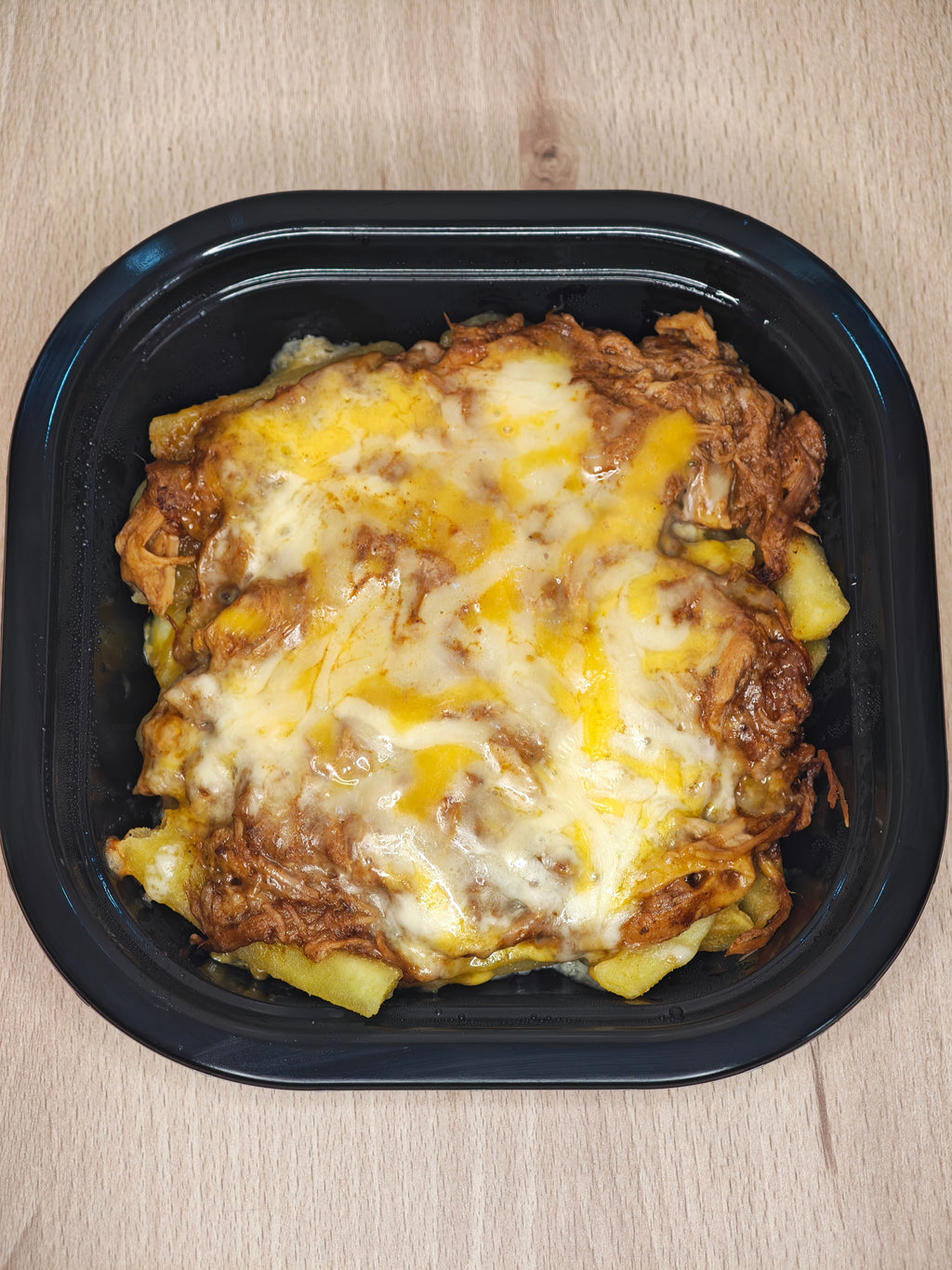 Pulled Pork con Patatas Baston y 4 Quesos