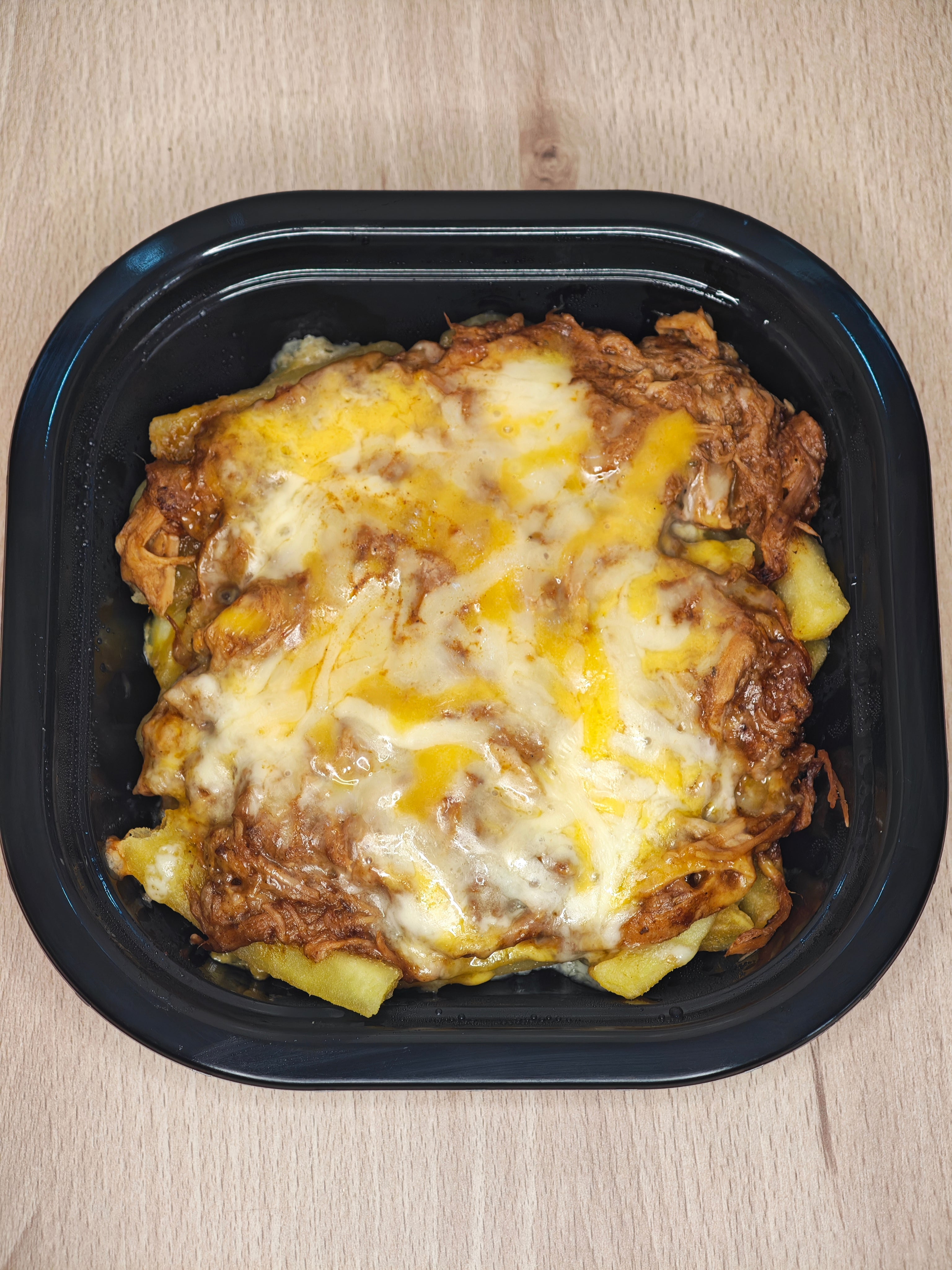 Pulled Pork con Patatas Baston y 4 Quesos