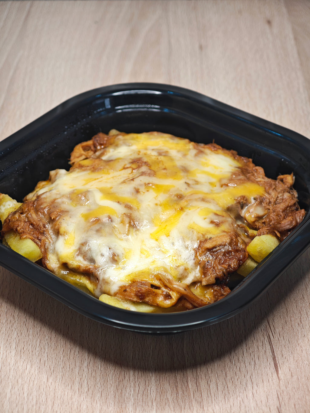 Pulled Pork con Patatas Baston y 4 Quesos