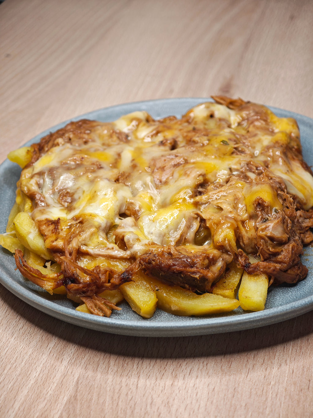 Pulled Pork con Patatas Baston y 4 Quesos